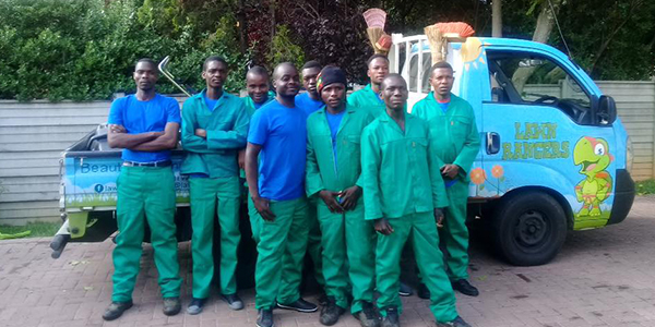 Lawn Rangers team and van
